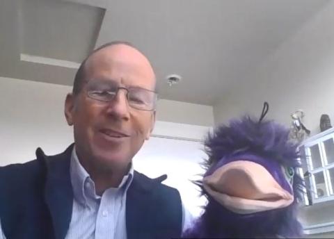 A still image of Alan Griffin and his puppet from Griffin's oral history interview on 22 March 2021