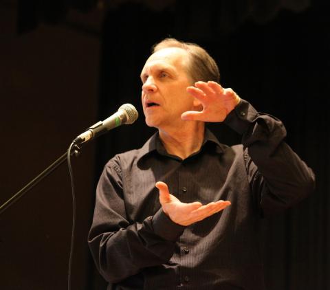 An image of Karl Behling performing a story circa 2018