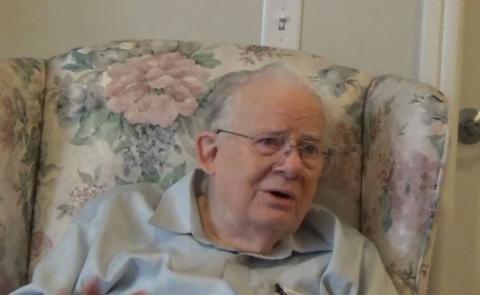 An image of George Mitton sitting in a chair, in his home, on December 16, 2016