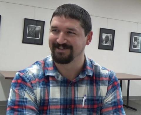 An image of Zach Robbins in the Stewart Library, discussing his grandfather-in-law's experiences serving in the U.S. Army during World War II on October 3, 2017