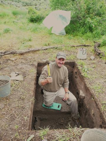 Dr. Brooke Arkush excavating in Southern Idaho