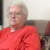 An image of Maxine Jamison, sitting in a chair, in her home, on May 26, 2017