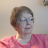An image of Carol Smith sitting in her home on August 30, 2017