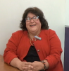 A still image of Angela Urrea during her oral history interview on May 21, 2019